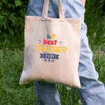 ote bag δασκάλα με σχέδιο The Best Teacher Ever και κύπελλο πρωταθλητή